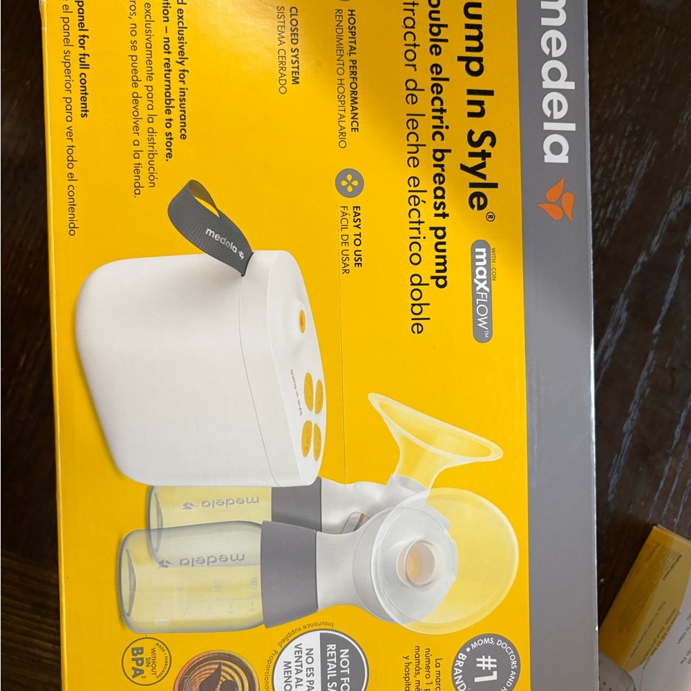 Medela Pump In Style with MaxFlow in White and Yellow